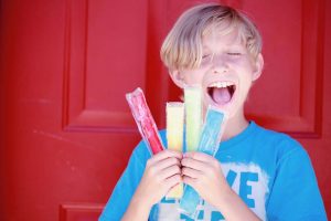 Child with Otter Pops