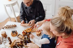 Family playing at a table