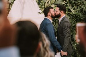 Two people kissing on Wedding Day