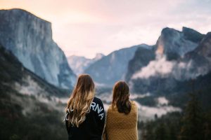 Two people standing in the Yosemite valley